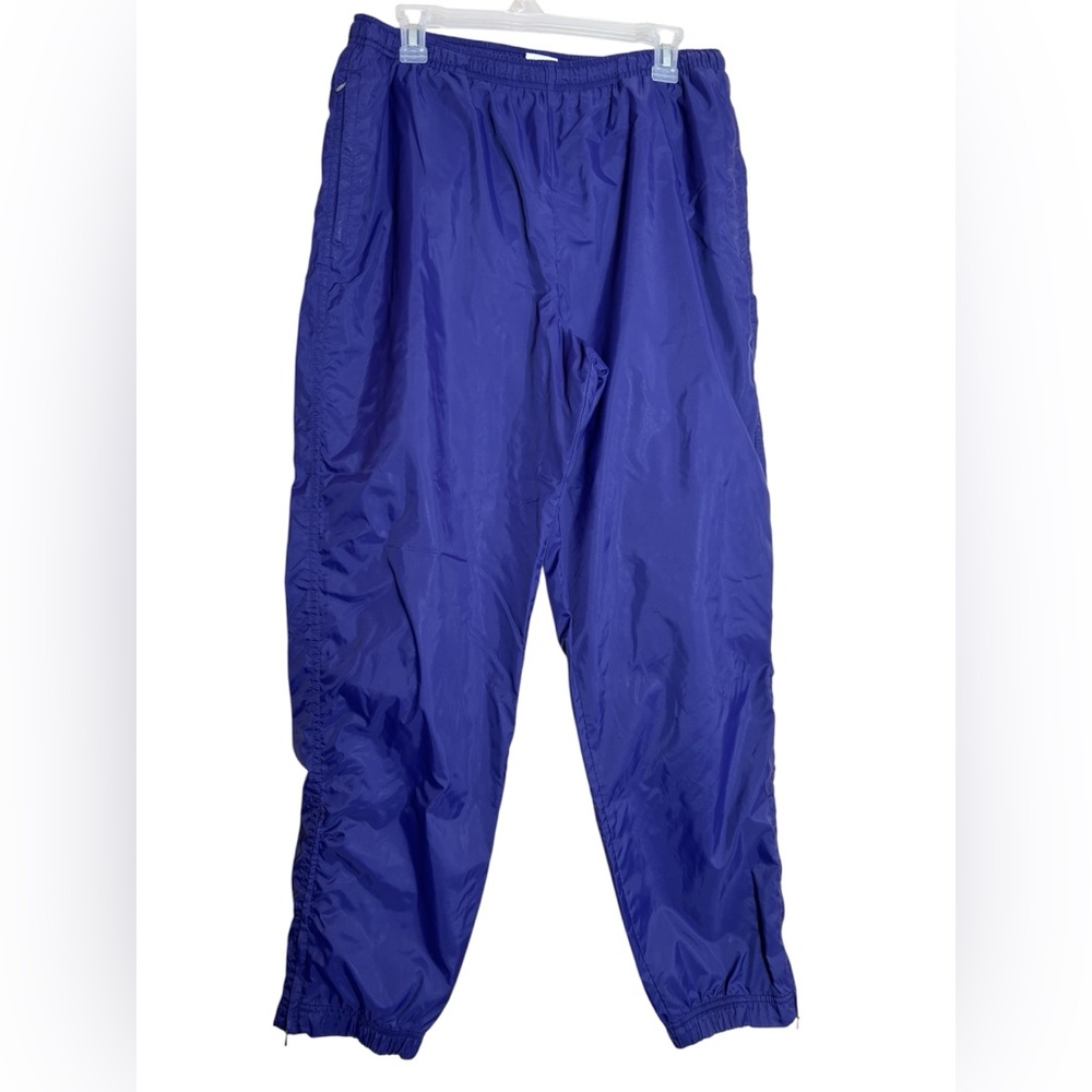Nike wind pants jogger women’s size large (12-14) Purple